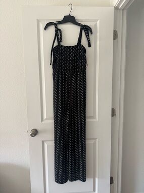 SO Black jumpsuit with White Dash Print and Tie Straps